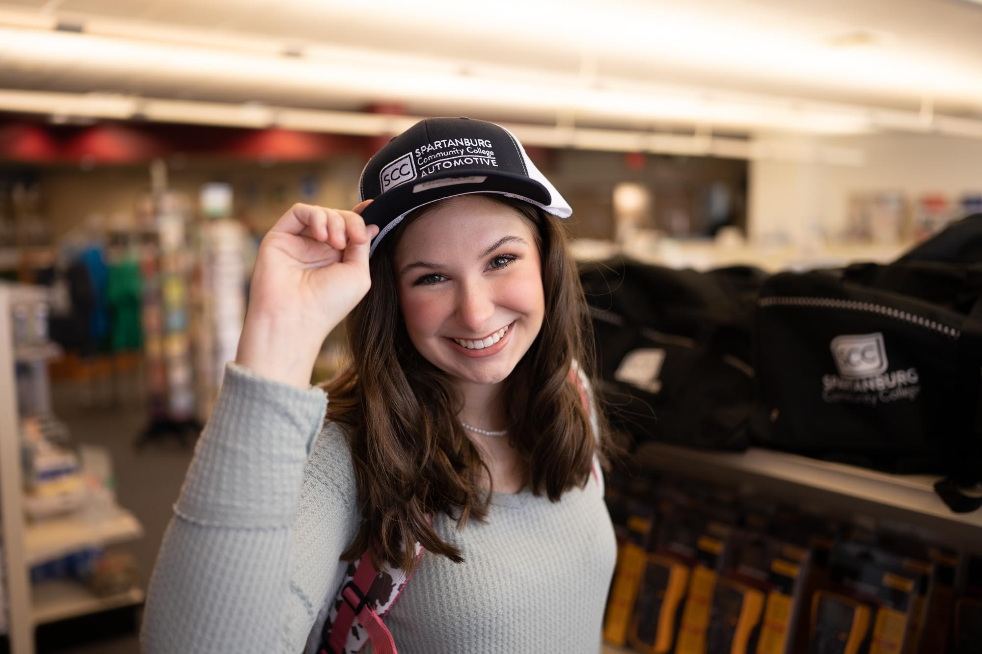 Person with cap smiling